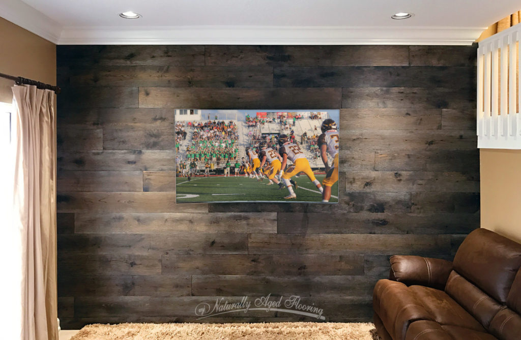 Warm and rustic hardwood flooring installed on the wall.