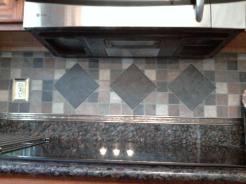 With a hand set 6" x 6" accent tile