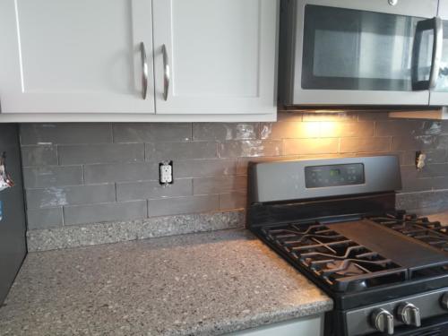 Grey high gloss subway tiles